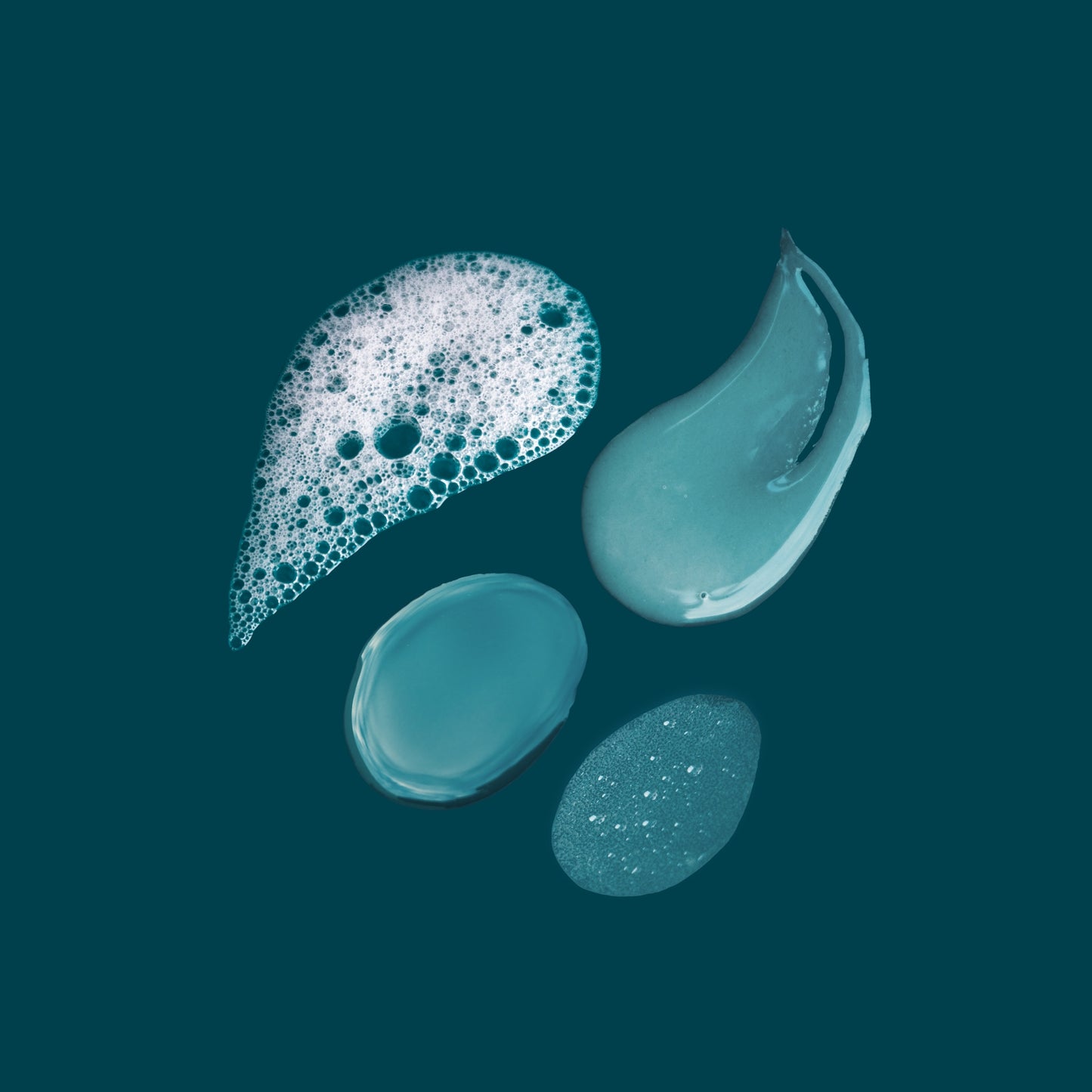 Texture swatches of Joyful Naturals full skincare routine showing cleanser bubbles, serum gel, and cream textures.