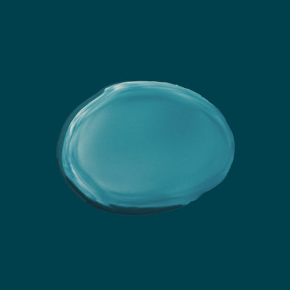 Lightweight non-greasy texture of Joyful Naturals jojoba face oil on teal background.