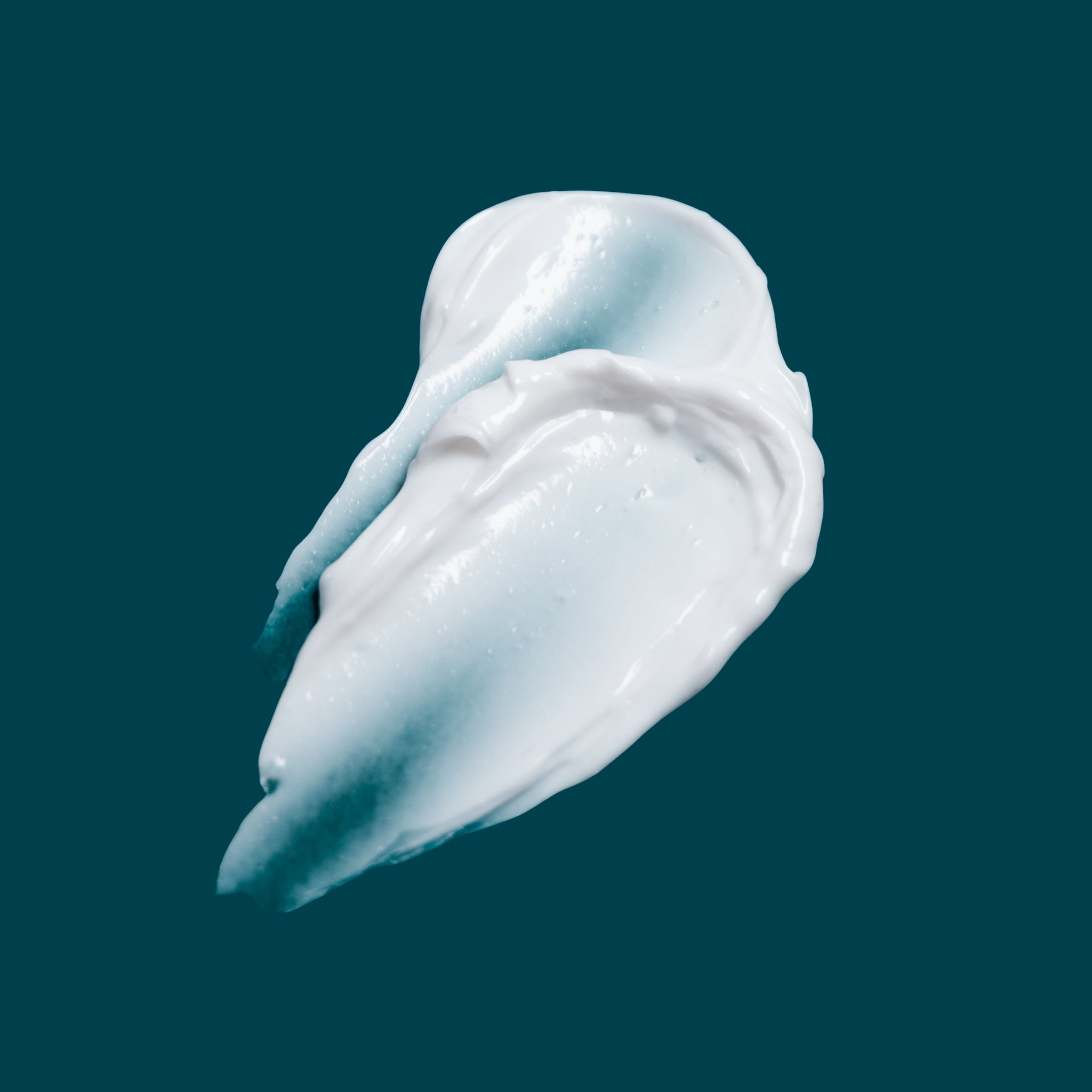 Rich whipped texture swatch of Joyful Naturals face cream showing deep nourishment.